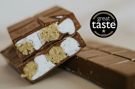 Chocolate bar with dubai pistachio and marshmallow fluff, featuring the Great Taste award logo.